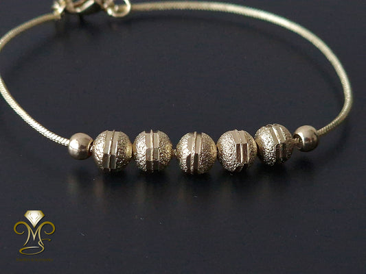 Trendy Chain and link Gold plated Spheres Bracelet