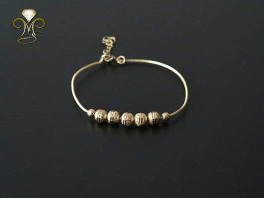 Trendy Chain and link Gold plated Spheres Bracelet