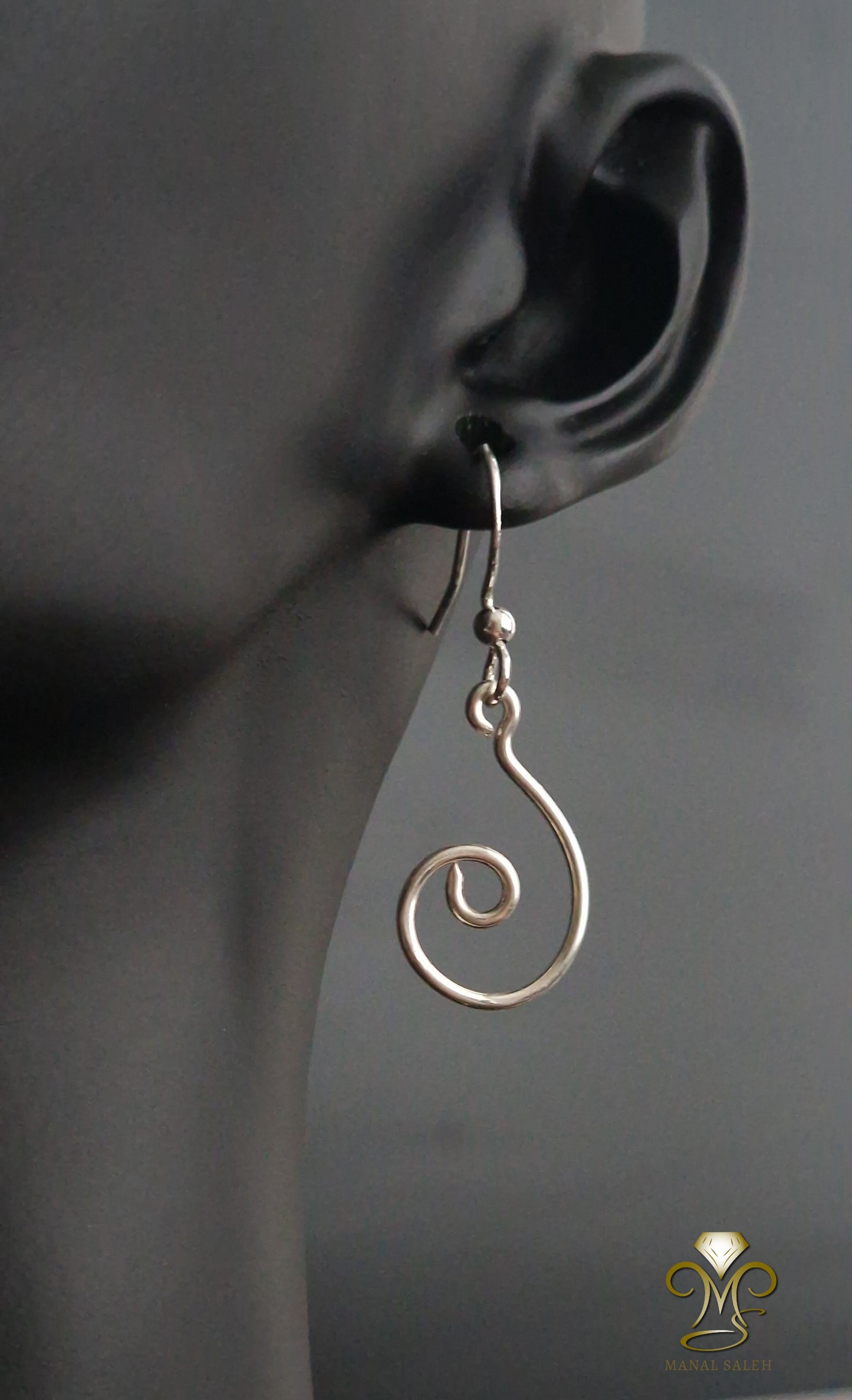 Small silver spin earrings