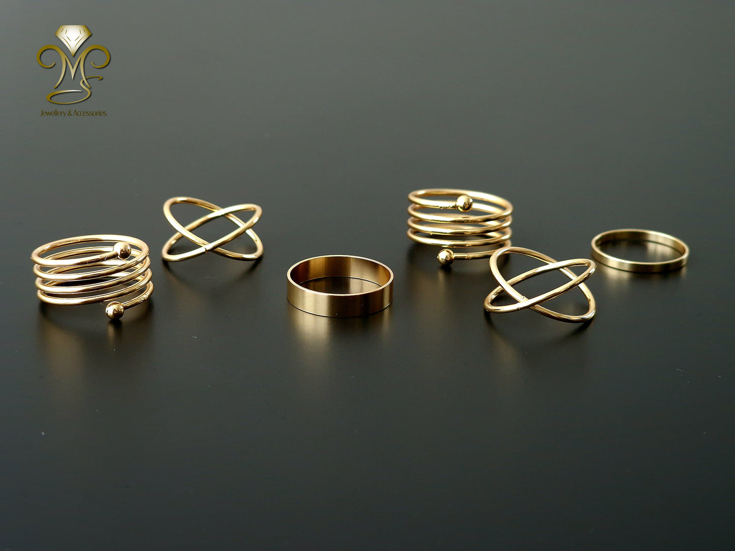Spiral golden rings set